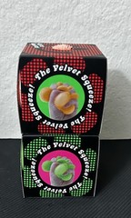 Authentic Schylling NeeDoh Flower Power Fuzz Ball Orange AND Green