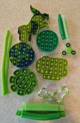 Green Dinosaur Sensory Fidget Pop It Spinner Tubes Toy Set Ages 4-12