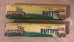2 Viral Sunny Days Squeezy Butter Sticks.