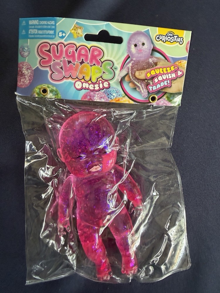 New Orb Sugar Swaps Onesi Pink Squishy Baby 5″ Squeeze Squish Glitter Toy 5+