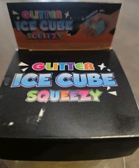 4 Glitter Ice Cube Squeezy Squishies. Blue, Yellow, Pink And Purple