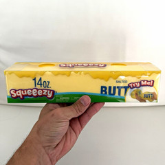 Squeeezy 14oz Salted Butter Tactile Squeeze Toy Yellow/Green/Blue Age 3-4