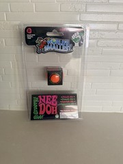WORLD’S SMALLEST NeeDoh The Groovy Glob *ORANGE*