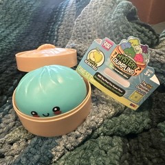 RMS Original Mystery Dumpling Apple Scented Pink Squeeze Toy 3+ Open Teal