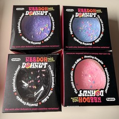 DohNut Switch & Swap Frosting Squeeze Toy, Pink/Purple/blue/ black