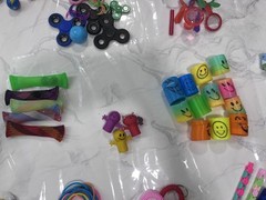Assorted Prizes Fidget Spinners Pop-It Bracelets Rings Cars & More 200+ Pieces
