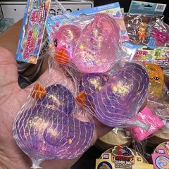 Sugar Swaps Duck Squish Squeeze & Stretch Toy, Purple Pink Glitter, Mesh Bag