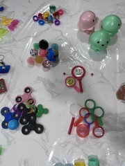 Assorted Prizes Fidget Spinners Pop-It Bracelets Rings Cars & More 200+ Pieces