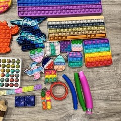 Pop Its Fidgets Squishes 60 + Toy Lot Stress Relieving Toys
