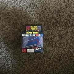 Schylling NeeDoh Nice Cube Swirlin’ USA Super Solid Squish Toy Red White Blue